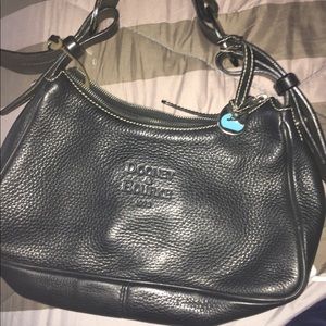 A black Dooney & bourke shoulder bag